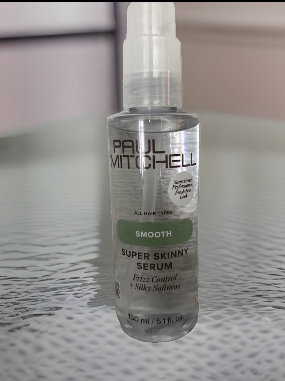 Paul Mitchell Smooth Super Skinny Serum Clear Bottle with Green Label